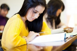 college students studying in classroom