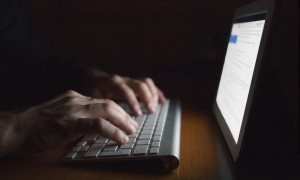 o-using-computer-in-dark-facebook-300x180